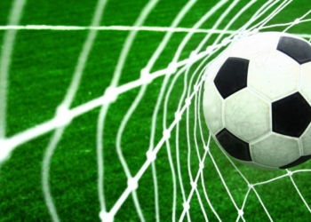 soccer football ball in goal net o1 750x400