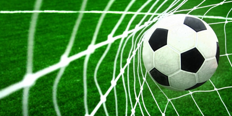 soccer football ball in goal net o1 750x400